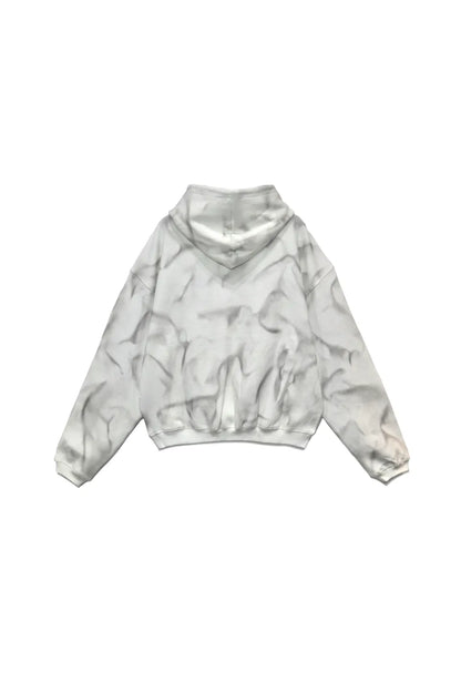 LUMINOUS DAWN EMBROIDERED LOGO HOODIE - WHITE の背面画像。全体に汚し加工の入った短丈のプルオーバーパーカー。