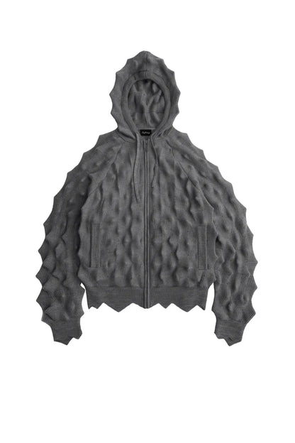 SPIKED ZIP-UP HOODIE MADFRENZYのグレーカラー平置き正面画像。特殊加工による立体的なスパイクテクスチャとジップアップフーディーデザイン。