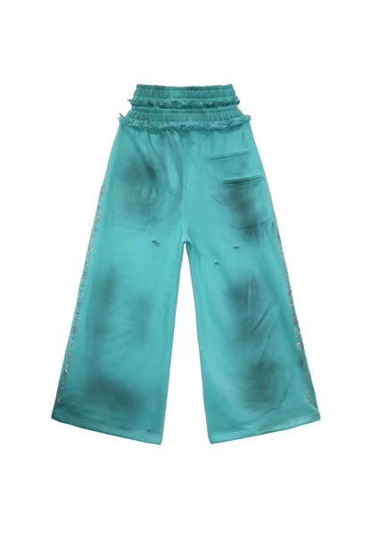 Versailles Galleria "INVWT" Double Waist Sweat Pants ターコイズの背面平置き画像。バックポケットと二重ウエスト。