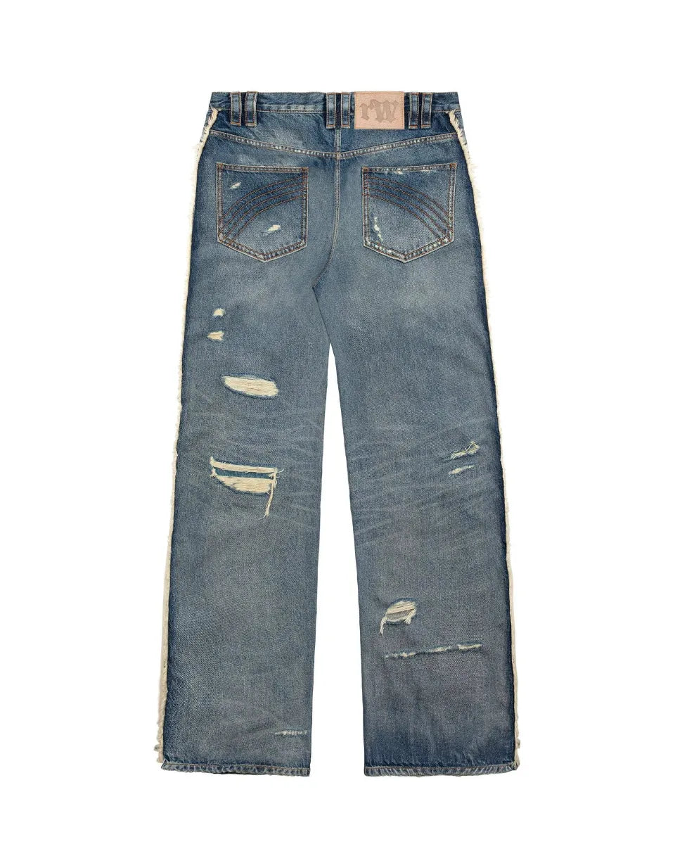 Track Jeans Racer Worldwideのインディゴブルーカラー平置き背面画像。明るいナチュラルカラーのハラコ調レザーパッチとヒップ周りのディテール。