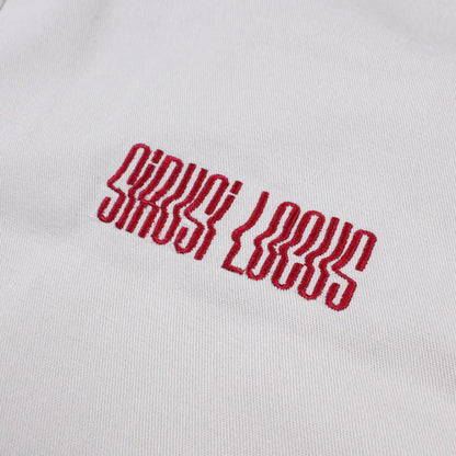 【SIRUSI LOCUS】 DISTORTION LOGOTYPE WORK PANTS 膝部 レッドグラフィック刺繍 ディテール