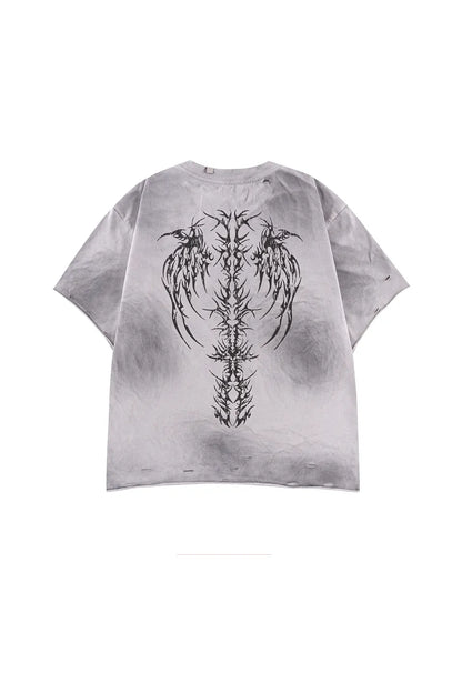 Pierced Tribal Bones Tee - Gray の背面。ボーン（骨）とトライバルを融合させた、鋭利なバックグラフィックデザイン。