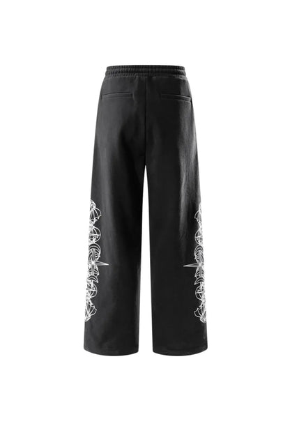 THE BOY HAS NO PATIENCE】 LUMINOUS DAWN ASTRAL LOGO FLOCKED PANTS 背面全体画像