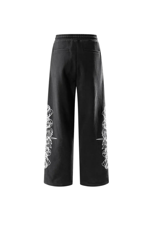 THE BOY HAS NO PATIENCE】 LUMINOUS DAWN ASTRAL LOGO FLOCKED PANTS 背面全体画像