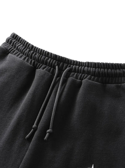 【THE BOY HAS NO PATIENCE】 LUMINOUS DAWN ASTRAL LOGO FLOCKED PANTS ウエストゴム・ドローコード詳細画像