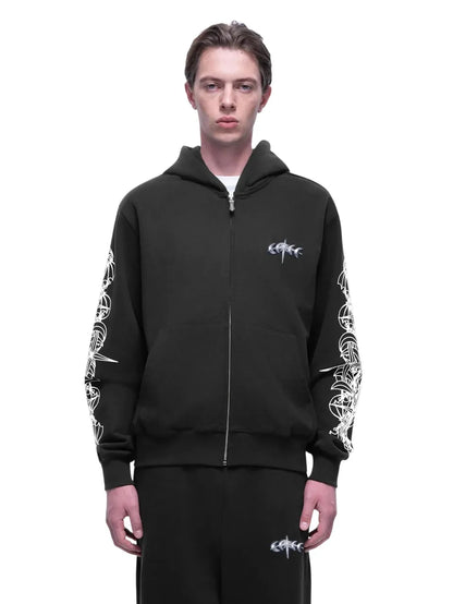 【THE BOY HAS NO PATIENCE】 LUMINOUS DAWN ASTRAL LOGO FLOCKED ZIP HOODIE （DARK GRAY） フロント胸ロゴグラフィック＆両袖プリント ジップアップパーカー 着用