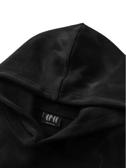 【THE BOY HAS NO PATIENCE】 LUMINOUS DAWN EMBROIDERED LOGO HOODIE （BLACK） フード立ち上がり部とブランドロゴタグのアップ画像
