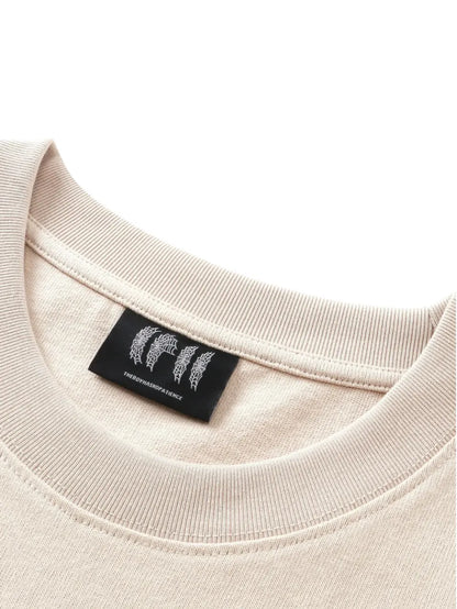THE BOY HAS NO PATIENCE Tシャツ 襟元リブ＆ブランド織りネームタグ
